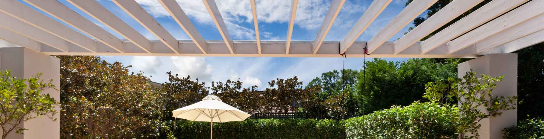 White pergolas | Thrive Landscape & Design